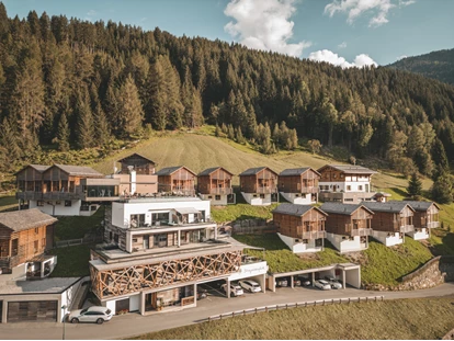 Hüttendorf - Schröcken - Unser Chaletdorf mit 12 Chalets und 2 Suiten - Boutique Hotel und Chalets Bergwiesenglück