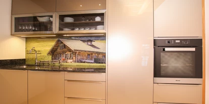Hüttendorf - Chaletgröße: 8 - 10 Personen - Eine hochwertige Miele Küche mit BORA System und voll ausgestattet!! - Chalet am Müllergut