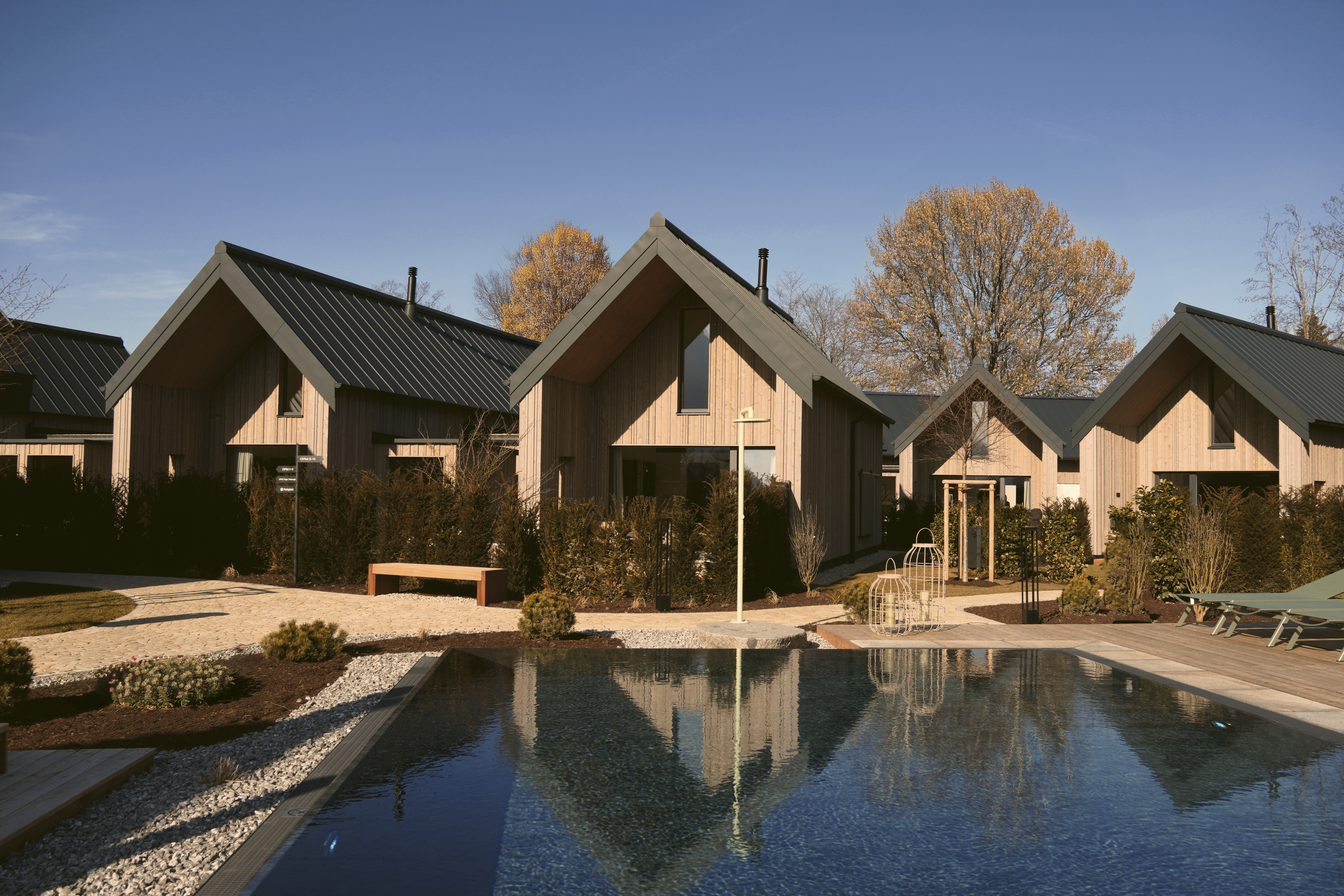 Hüttendorf - Kitzbühel - Außenpool des Chaletdorfes  - Agrad Chalets