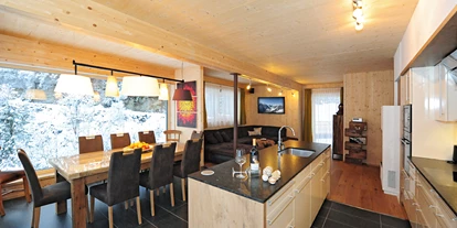 Hüttendorf - Chaletgröße: 4 - 6 Personen - Pinzgau - Chalet Glemmtal - Haus Schmittenblick Wohnzimmer und Küche - Chalet Glemmtal