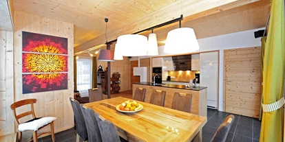 Hüttendorf - Chaletgröße: 4 - 6 Personen - Pinzgau - Chalet Glemmtal - Haus Schmittenblick Wohnzimmer und Küche - Chalet Glemmtal