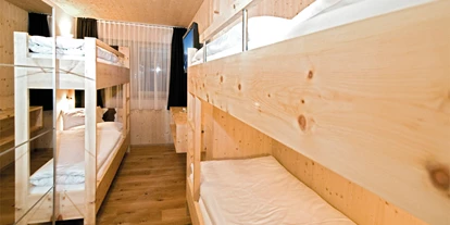 Hüttendorf - Chaletgröße: 4 - 6 Personen - Pinzgau - Chalet Glemmtal - Haus Schmittenblick Schlafzimmer (Stockbetten) - Chalet Glemmtal
