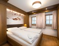 Chalet: Schlafzimmer im Chalet Edelweiß - EDELWEISS CHALETS Zauchensee