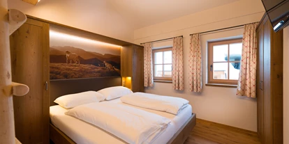 Hüttendorf - Weng (Goldegg) - Schlafzimmer Chalet - EDELWEISS CHALETS Zauchensee