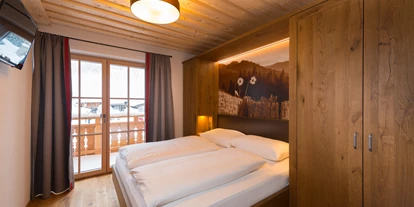 Hüttendorf - Weng (Goldegg) - Schlafzimmer Chalet - EDELWEISS CHALETS Zauchensee