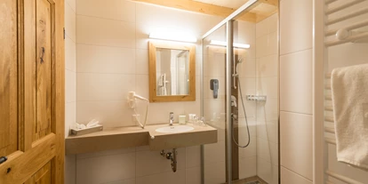 Hüttendorf - Weng (Goldegg) - Eines der Badezimmer im Chalet - EDELWEISS CHALETS Zauchensee