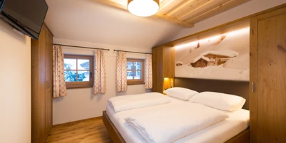 Hüttendorf - Weng (Goldegg) - Schlafzimmer Chalet - EDELWEISS CHALETS Zauchensee