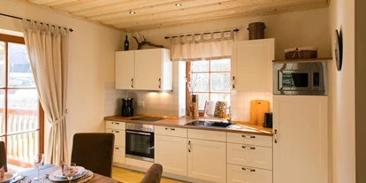 Hüttendorf - PLZ 38871 (Deutschland) - Die Chalets haben alle eine Einbauküche mit Komplettausstattung. - Chalets zum Ilsetal
