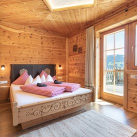 Chalet: 2 Schlafzimmer - jeweils mit eigenem Badezimmer. - Ferienhütten Tirol