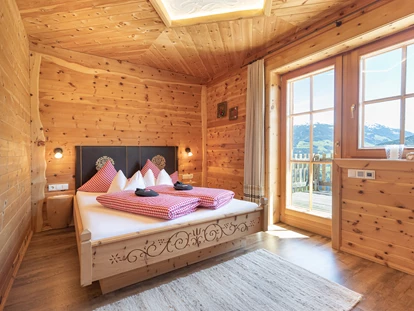 Hüttendorf - Chaletgröße: 8 - 10 Personen - 2 Schlafzimmer - jeweils mit eigenem Badezimmer. - Ferienhütten Tirol