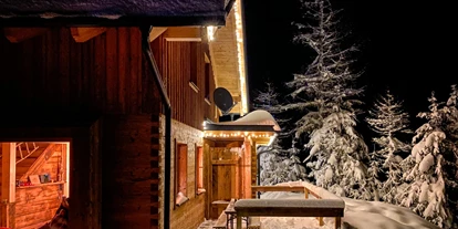 Hüttendorf - Chaletgröße: 8 - 10 Personen - Winterlandschaft - Almhütten Sprachmann Flattnitz