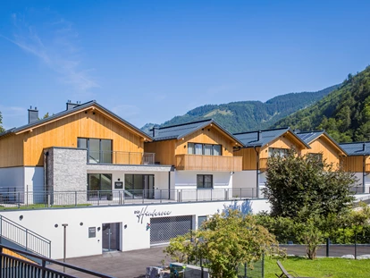 Hüttendorf - Chaletgröße: 8 - 10 Personen - Tiefgaragenparkplatz direkt bei den Chalets und im Preis inkludiert - DAS Hintersee****