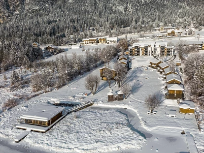 Hüttendorf - Faak am See - Das Lake Resort befindet sich direkt am Pressegger See und ist nur 12km vom Skigebiet Nassfeld entfernt. - Lake Resort Pressegger See