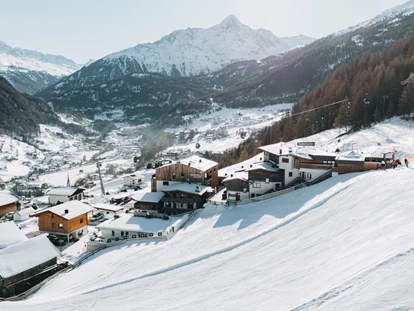 Hüttendorf - Pfunds - Chalets & Aparthotel Grünwald Resort Sölden mit Pool an der Piste