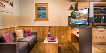 Hüttendorf - Pfunds - Wohnzimmer - Wellness Hüttendorf Wiese