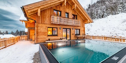Hüttendorf - Chaletgröße: 8 - 10 Personen - Chalet Typ SUX-STM mit Pool - Hüttendorf Dachsteinblick