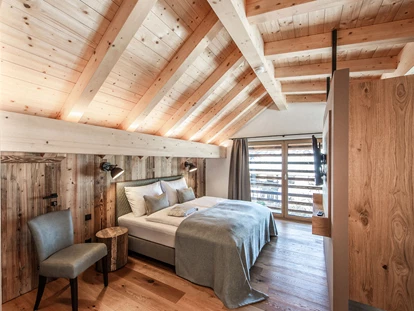 Hüttendorf - Chaletgröße: 8 - 10 Personen - Masterbedroom im Dachgeschoss mit Seeblick - Im Franzerl am Weissensee
