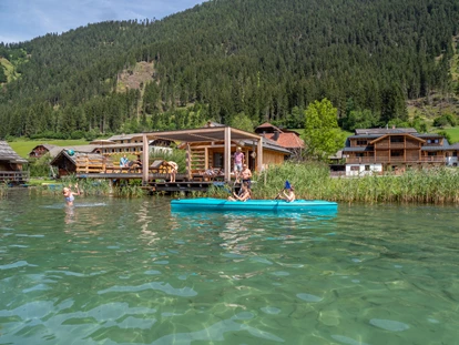Hüttendorf - Chaletgröße: 8 - 10 Personen - Badesteg mit Badehaus. Ganz privat, nur für Ihre Gruppe. - Im Franzerl am Weissensee