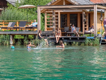Hüttendorf - Chaletgröße: 8 - 10 Personen - Badesteg mit Badehaus. Ganz privat, nur für Ihre Gruppe. - Im Franzerl am Weissensee