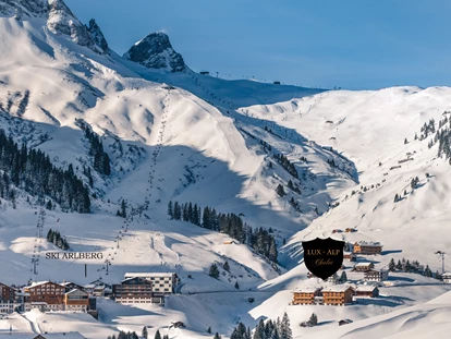 Hüttendorf - Schröcken - In Warth hat man die Qual der Wahl - denn man befindet sich direkt am Einstieg des schneereichsten und weitläufigsten Skigebiet der österreichischen Alpen. Es warten über 300 bestens präparierte Pistenkilometer (Pistengütesiegel). Skispaß pur ohne Wartezeiten, sowie die besten Tiefschneebedingungen am Arlberg. 
 - Lux Alp