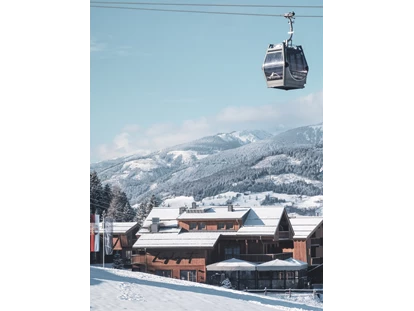 Hüttendorf - Chaletgröße: 4 - 6 Personen - Pinzgau - Gondel der Maiskogelbahn direkt vorm Zaglgut - Bergdorf Hotel Zaglgut Ski In & Ski Out