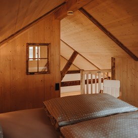 Chalet: Schlafzimmer Dachgeschoss  - Oberwald Chalets 