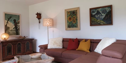 Hüttendorf - Toblach - Wohnzimmer - Lodge Mira  - TYROL PURElife Lodges