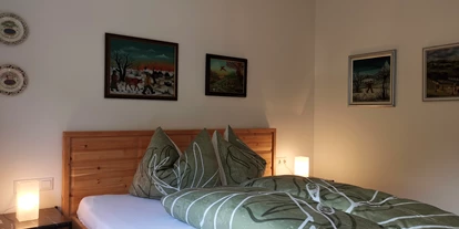 Hüttendorf - Toblach - Schlafzimmer 1 (Erdgeschoss) - Lodge Mira  - TYROL PURElife Lodges