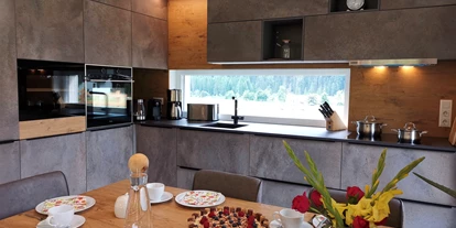 Hüttendorf - Toblach - Küche - Lodge Sirius  - TYROL PURElife Lodges