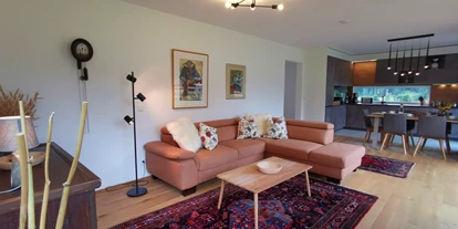 Hüttendorf - Toblach - Wohnzimmer - Lodge Sirius  - TYROL PURElife Lodges