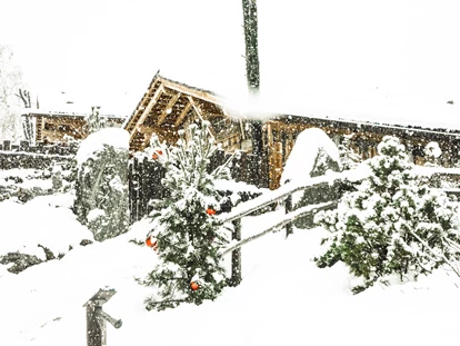 Hüttendorf - Whirlpool: beim Chalet - Chalet Resort - ZU KIRCHWIES