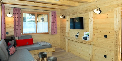 Hüttendorf - Schröcken - Wohnbereich in den großen Hütten -  Lechtal Chalets