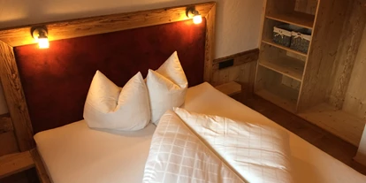 Hüttendorf - Schröcken - Schlafzimmer Kuschelhütte -  Lechtal Chalets
