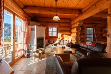 Chalet: Wohnzimmer mit Kaminofen - Kreischberg Lodge