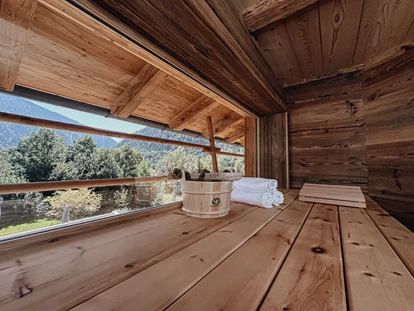 Hüttendorf - Fügenberg - Chalets Bayrischzell mit privatem Hottub und Sauna