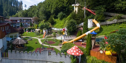 Hüttendorf - Faak am See - Smileys Outdoorspielbereich  - Smileys Fluss Chalet