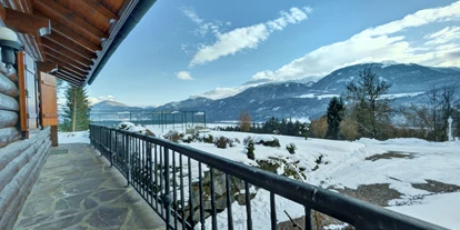 Hüttendorf - Chaletgröße: 8 - 10 Personen - Außenbereich  im Winter - Glocknerhaus Naturdomizil