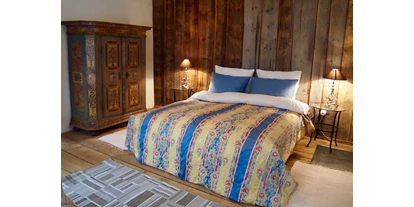 Hüttendorf - Hohentauern - 1. Schlafzimmer - Romantische Ferienhütte