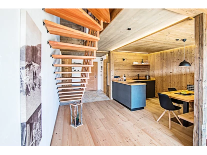 Hüttendorf - Whirlpool: beim Chalet - "comfort suite" - STERN MOUNTAIN CHALETS ****