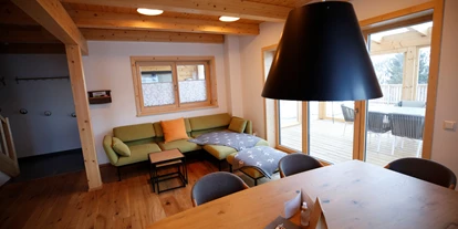 Hüttendorf - Chaletgröße: 8 - 10 Personen - Wohnzimmer Rotfuchs - Designchalets Heidialm-Falkertsee