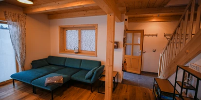 Hüttendorf - Chaletgröße: 8 - 10 Personen - Wohnbereich Schneehase - Designchalets Heidialm-Falkertsee
