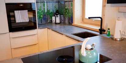 Hüttendorf - Chaletgröße: 8 - 10 Personen - Wohnküche Schneehase - Designchalets Heidialm-Falkertsee