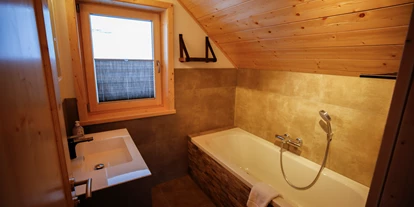 Hüttendorf - Chaletgröße: 8 - 10 Personen - Doppelzimmer, Schneehase - Designchalets Heidialm-Falkertsee