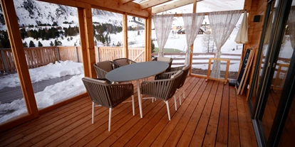 Hüttendorf - Chaletgröße: 8 - 10 Personen - Badezimmer mit Badewanne OG. Schneehase - Designchalets Heidialm-Falkertsee