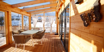 Hüttendorf - Chaletgröße: 8 - 10 Personen - Wintergarten - Designchalets Heidialm-Falkertsee