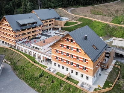 Hüttendorf - Schröcken - Das neue Berghaus am Dorfzentrum von Schröcken von oben
Chalets - Apartments - Spa
Basecamp für Bergfreunde, 2-20 Personen - Berghaus Schröcken