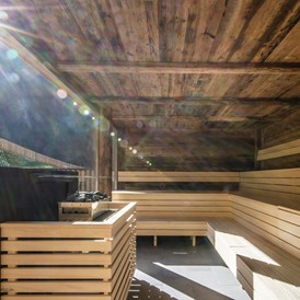 Chalet: Sauna im Wellnessbereich im Berghaus Schröcken - Berghaus Schröcken
