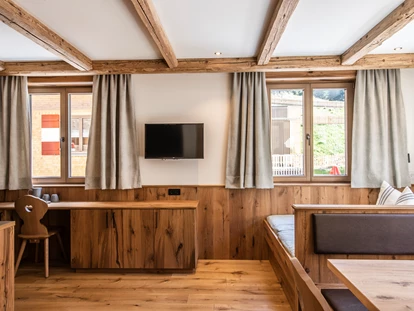 Hüttendorf - Schröcken - Wohnbereich im Apartment im Berghaus Schröcken - Berghaus Schröcken