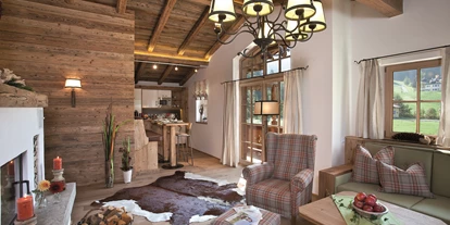Hüttendorf - PLZ 5672 (Österreich) - Châlet Wohnraum mit Küche - Chalets am Hotel Der Lärchenhof