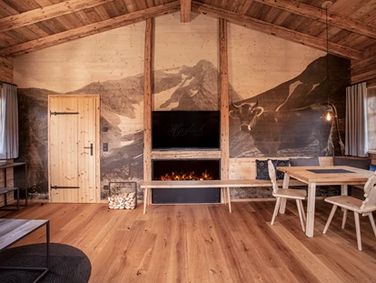 Hüttendorf - Schröcken - Wohnbereich Chalet Bearglar - Alpglück Chalets *****